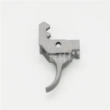 Parti MIM con grilletto a pistola